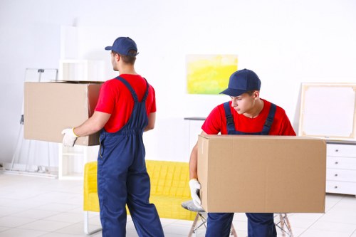 Moving van and packed boxes prepared for a house removal in East Finchley