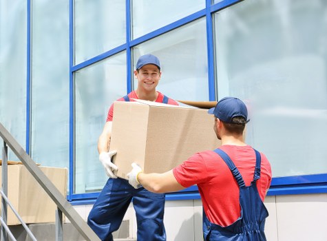 Removal van and moving boxes for an East Finchley house move