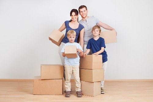 Checklist and packed moving boxes for a house move in East Finchley