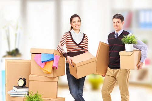 Office boxes and furniture arranged for delivery during a commercial move