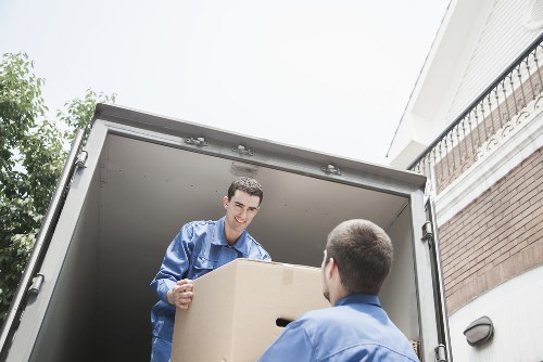 Packing desks and office equipment for a move in East Finchley