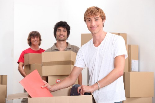 Unpacking service helping set up rooms after a move