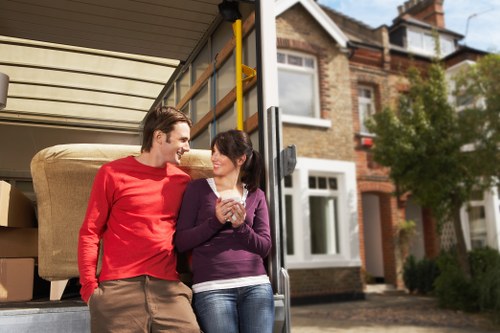 Loading furniture into a van for a local move in East Finchley